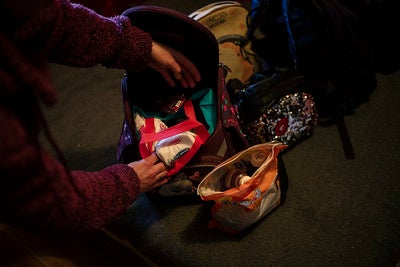 Albina shows 4 backpacks, which are all what they could take them when fleeing from Mikolayev. Inside, only medicines and their documents. Drochia, Moldova. Photo: UN Women