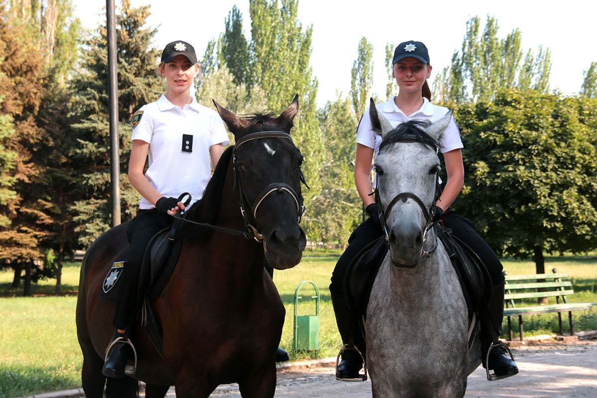 Ukrainian patrol policewomen on horseback