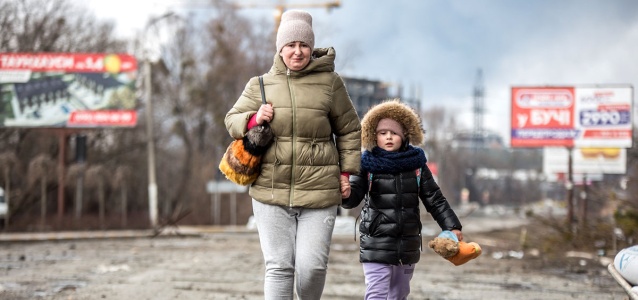 A mother and her child are fleeing violence, Bucha, Kyiv Oblast, Ukraine, 4 March 2022